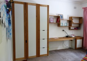 Child's wardrobe and work station Custom made wardrobe and work station, American oak and rhino ply.