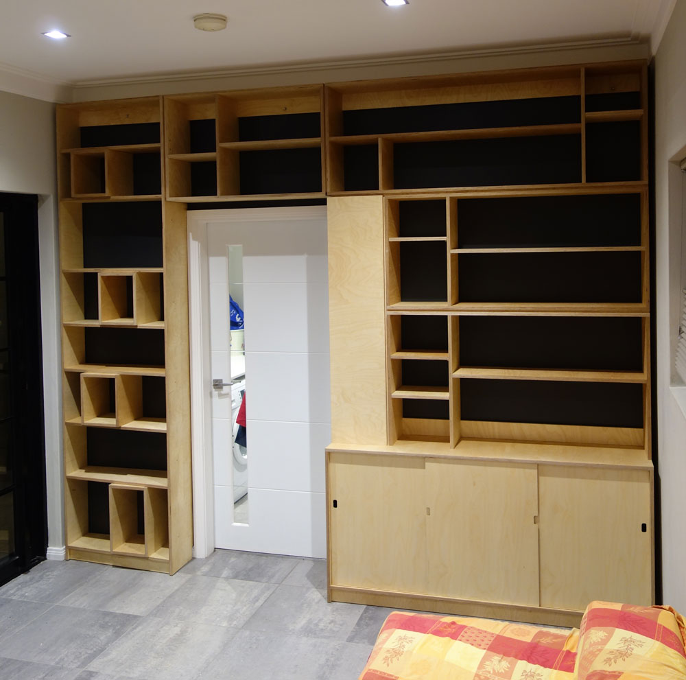 Cusom wall unit, shelves and cabinet in Birch Plywood