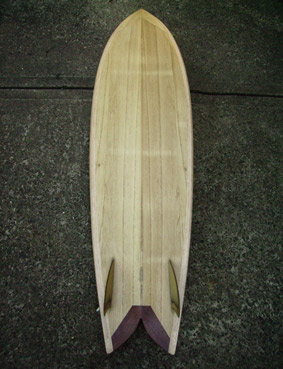 Custom made hollow wooden surfboars