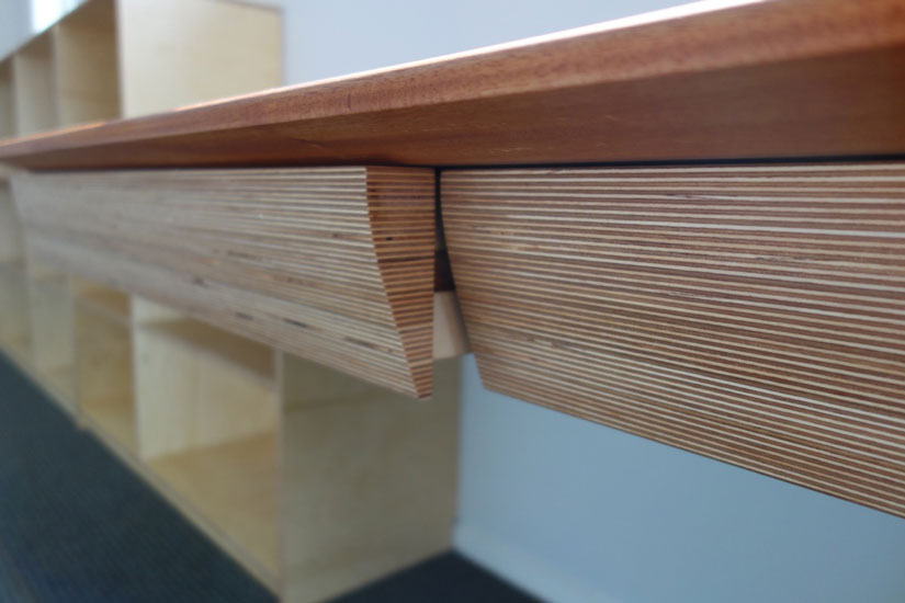 Birch ply and mahogany desk and shelves combination, drawer detail